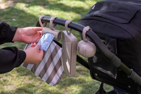 Ubbi Retractable On-the-Go Bag Dispenser for Baby Travel, Diaper Bag Accessory Must Have for Newborns, Helpful Baby Accessory, Taupe - Image 8